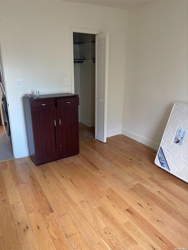 unfurnished bedroom featuring light hardwood / wood-style flooring