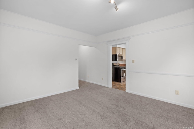 empty room with light colored carpet