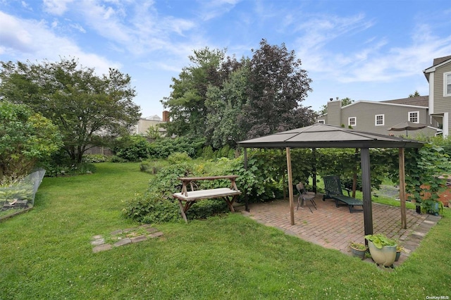 view of yard with a gazebo and a patio area