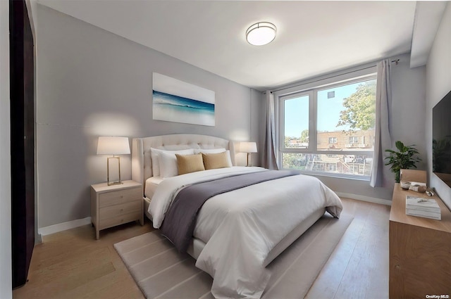 bedroom featuring light hardwood / wood-style floors