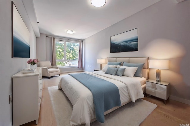 bedroom featuring light hardwood / wood-style floors