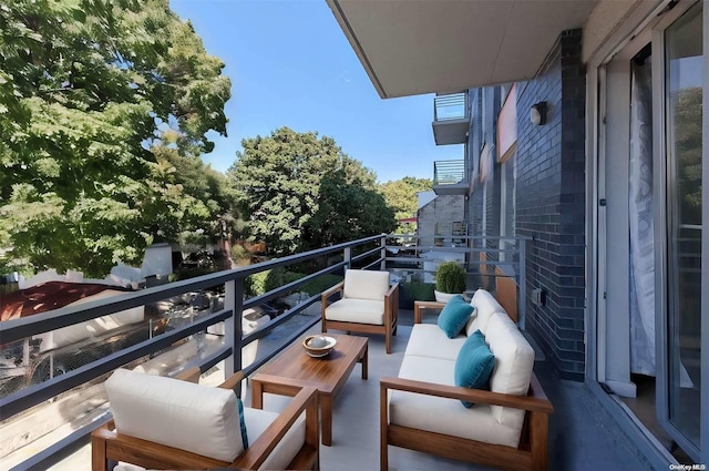 balcony with an outdoor hangout area