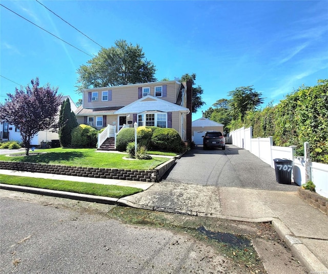 front of property featuring a front lawn