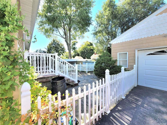 deck featuring a garage