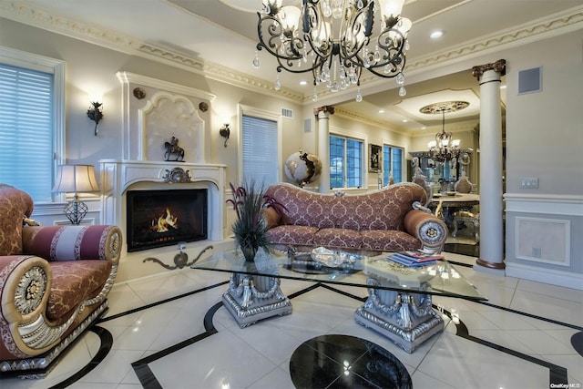 living room with tile patterned floors, ornate columns, and ornamental molding