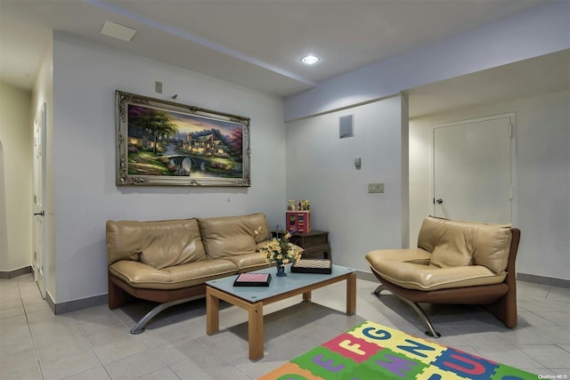 living room with light tile patterned floors