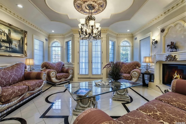 tiled living room with crown molding and an inviting chandelier