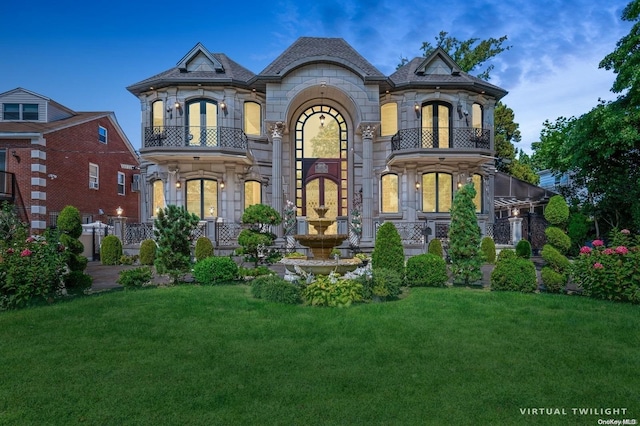 view of front of home with a front yard