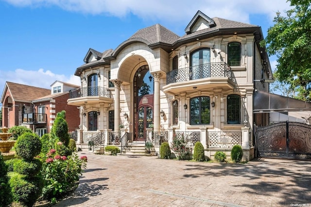 view of front of house with a balcony