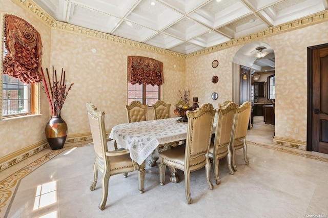 dining room featuring beam ceiling and coffered ceiling