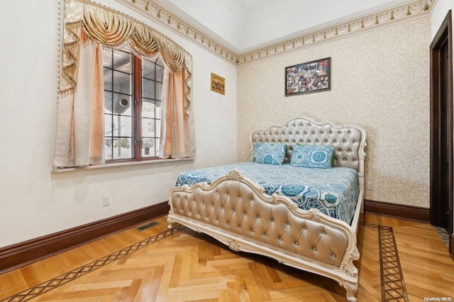 bedroom with parquet flooring