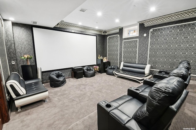 cinema room featuring carpet flooring