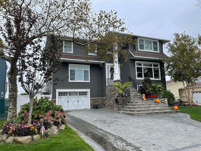 view of front of home with a garage