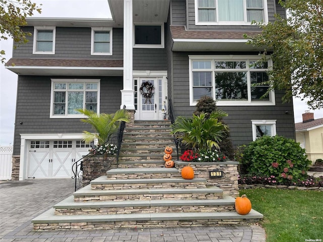 view of front of home with a garage