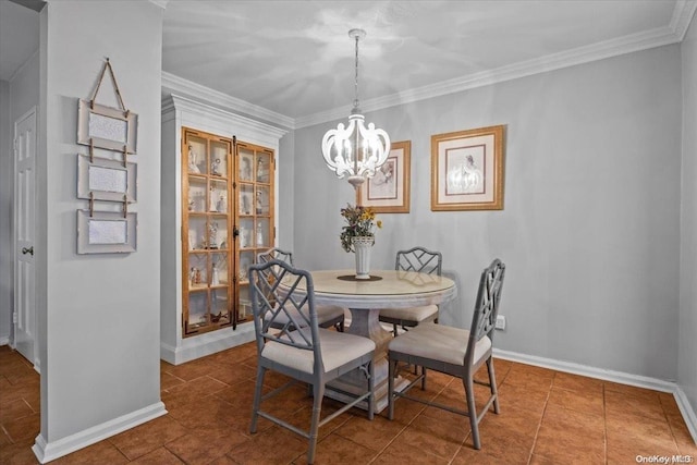 dining space featuring tile patterned floors, a chandelier, and ornamental molding