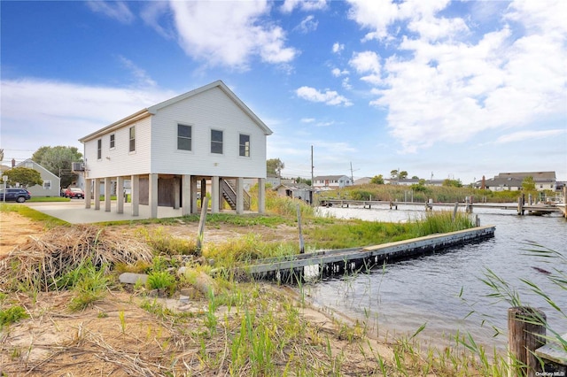 view of dock with a water view