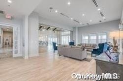 living room with light hardwood / wood-style floors