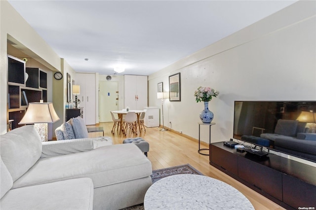 living room with light hardwood / wood-style floors