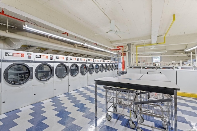 washroom with independent washer and dryer