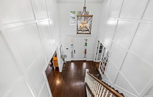 entryway with dark hardwood / wood-style floors