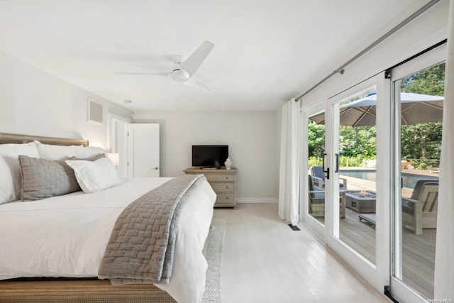 bedroom with ceiling fan, light hardwood / wood-style floors, and access to exterior