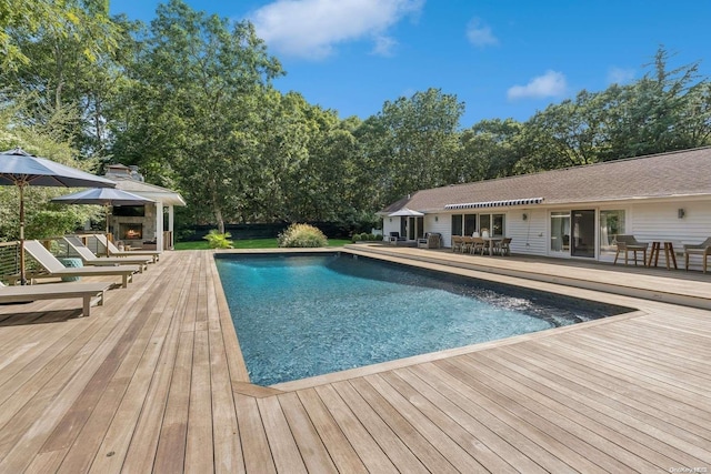 view of pool with a wooden deck