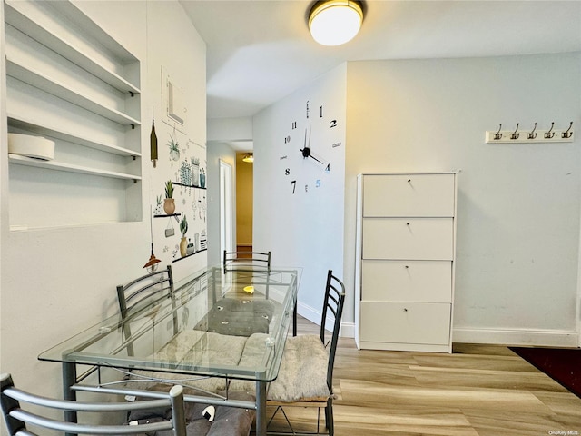 dining space featuring light hardwood / wood-style flooring