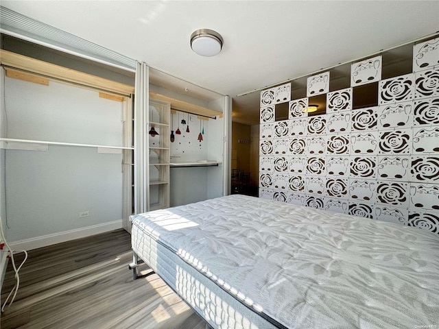 bedroom featuring hardwood / wood-style flooring