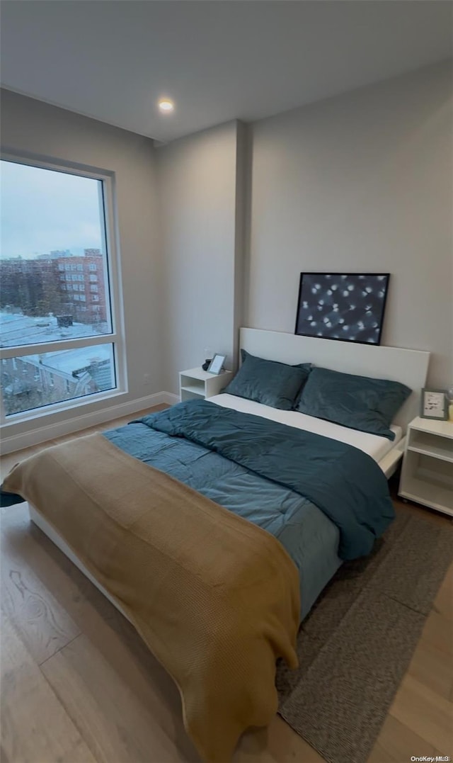 bedroom featuring hardwood / wood-style flooring