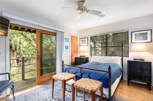 bedroom with ceiling fan and light wood-type flooring