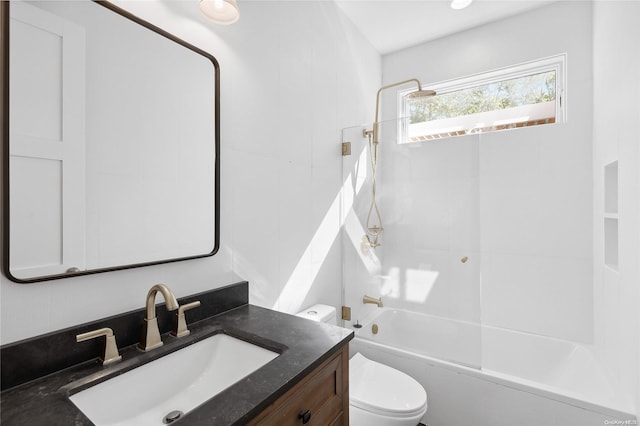 full bathroom featuring shower / bathing tub combination, vanity, and toilet