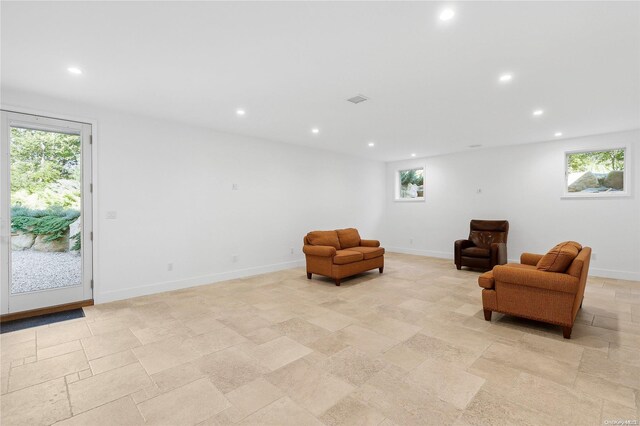 sitting room featuring a wealth of natural light