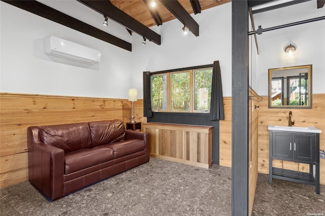 living room featuring sink, wooden ceiling, beamed ceiling, a wall unit AC, and wood walls