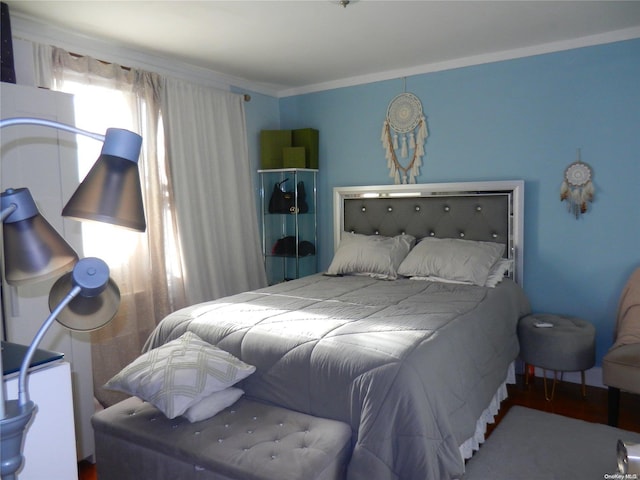 bedroom featuring ornamental molding