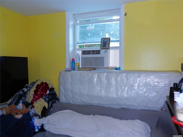 bedroom featuring cooling unit