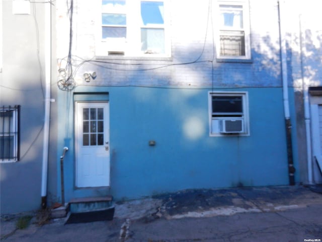 exterior space with cooling unit