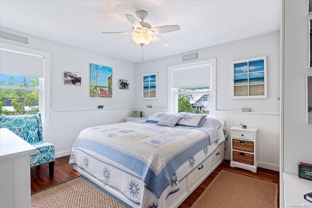 bedroom featuring ceiling fan and wood-type flooring