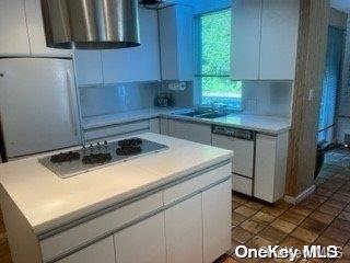 kitchen with dishwasher, a center island, white cabinetry, ventilation hood, and gas stovetop