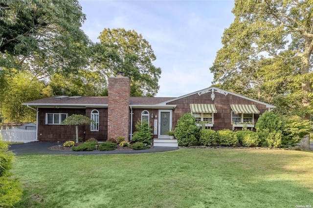 view of front of house with a front lawn