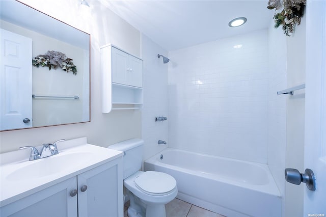 full bathroom with tile patterned flooring, vanity, toilet, and tiled shower / bath