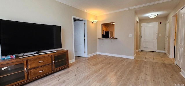 living room featuring light hardwood / wood-style floors and crown molding