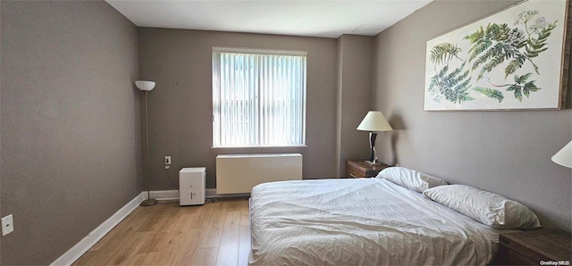 bedroom featuring light hardwood / wood-style floors