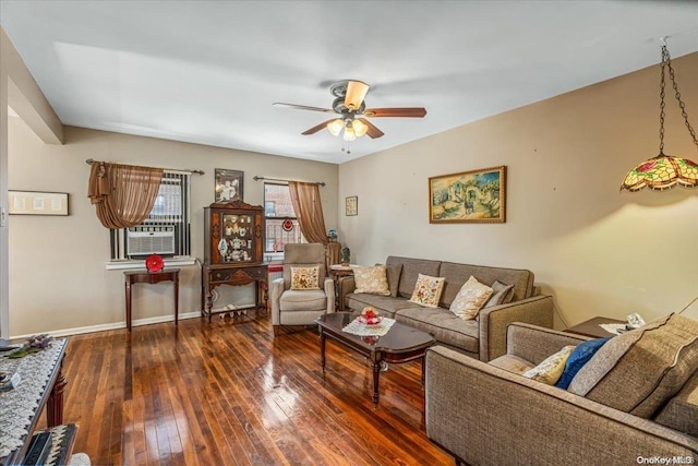 living room with ceiling fan, cooling unit, and dark hardwood / wood-style flooring