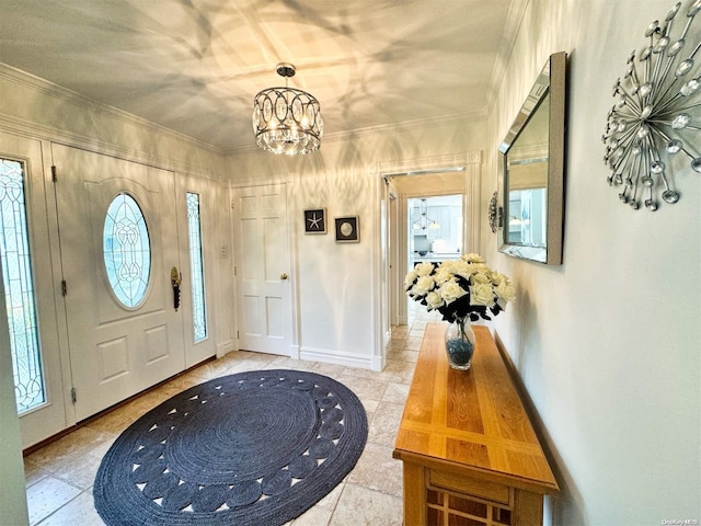 foyer with a wealth of natural light, a chandelier, and ornamental molding