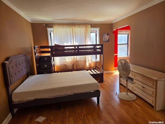 bedroom featuring wood-type flooring