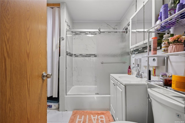 full bathroom with tiled shower / bath, vanity, and toilet