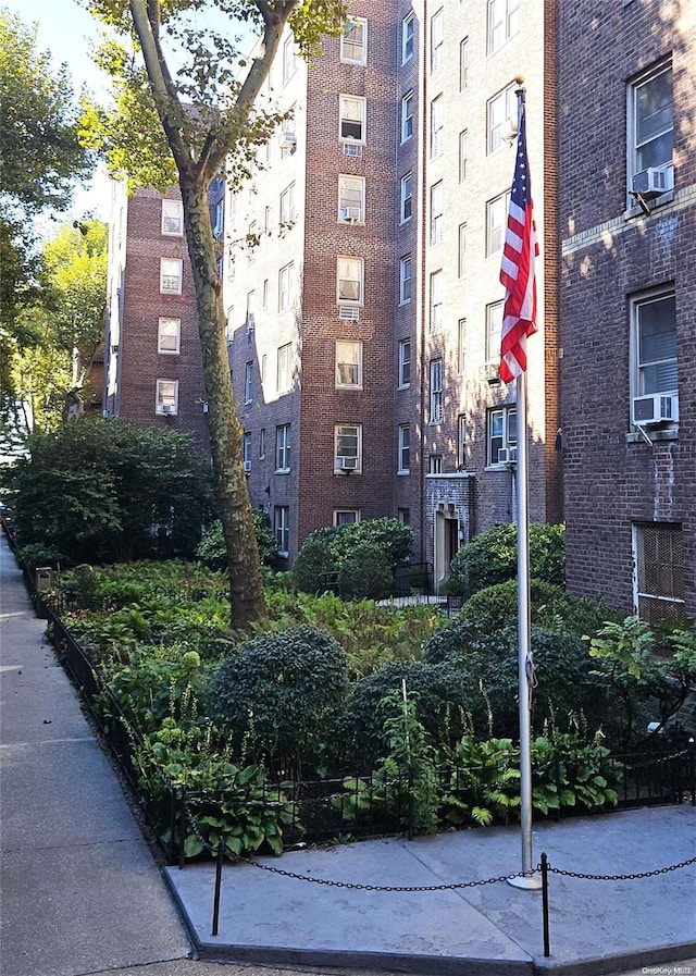 view of building exterior with cooling unit