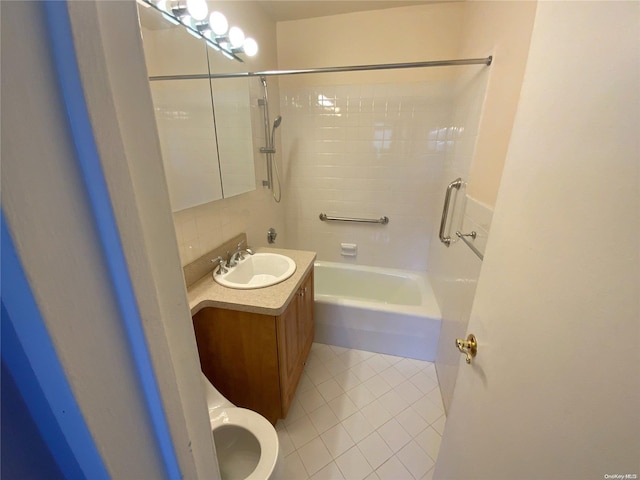 bathroom featuring decorative backsplash, vanity, tile patterned floors, and tiled shower / bath combo