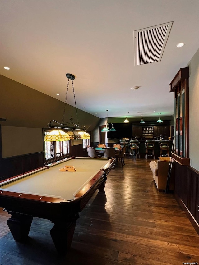 game room with bar area, dark hardwood / wood-style floors, lofted ceiling, and billiards