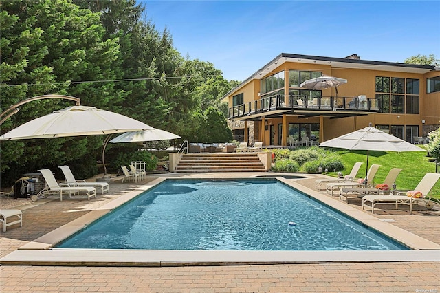 view of pool with a patio